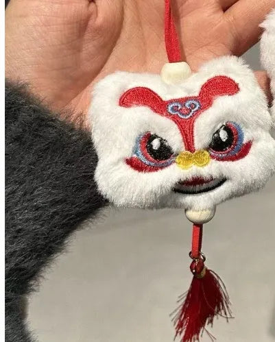 Chinese style blue plush lion keychain ornament with star stone decoration and yellow tassel