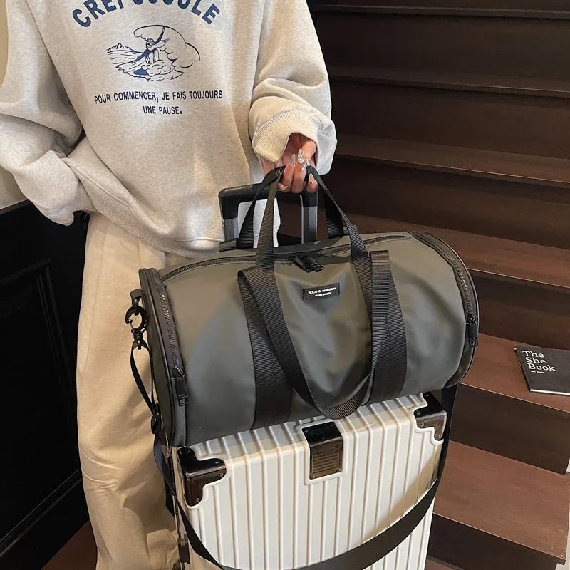 Waterproof Oxford cloth sports handbag in black, dark gold, or dark grey for leisure travel