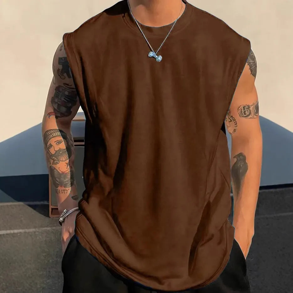 Men's loose sleeveless cotton tank top in a solid colour on a hanger
