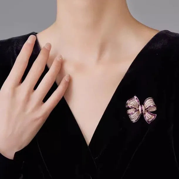 Purplish red or blue bow-shaped alloy brooch for women
