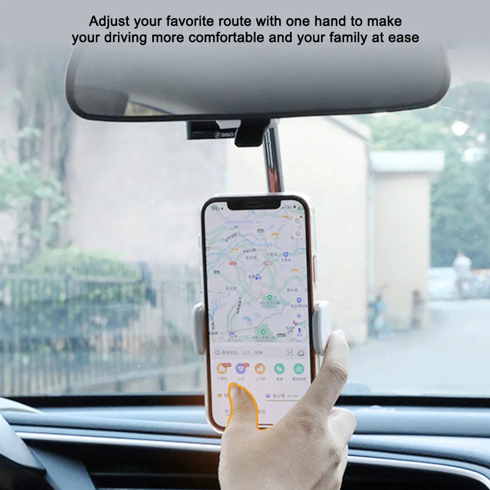 Black car phone holder mounted on rearview mirror showing 360-degree rotation mechanism