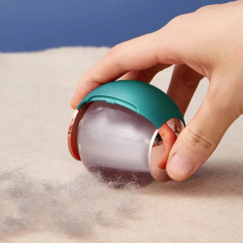 Reusable lint roller hair remover ball in Green Gold colour, removing pet hair from fabric