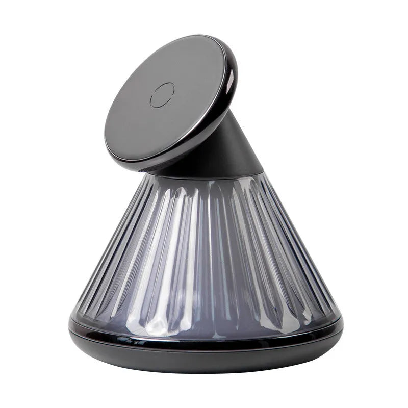 Night table lamp with integrated wireless charging station showing magnetic seat for smartphones