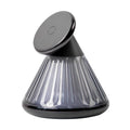 Night table lamp with integrated wireless charging station showing magnetic seat for smartphones