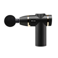Compact mini massage gun in red, with USB port and control button, on white background