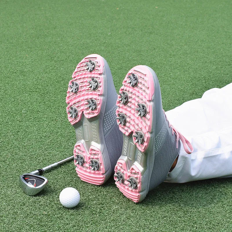 Women's waterproof golf sneakers with white or pink microfiber upper and natural rubber outsole