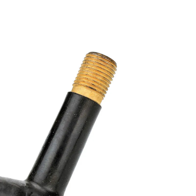 Aluminium alloy mountain bike tyre valve cap in assorted colours on a bicycle wheel.
