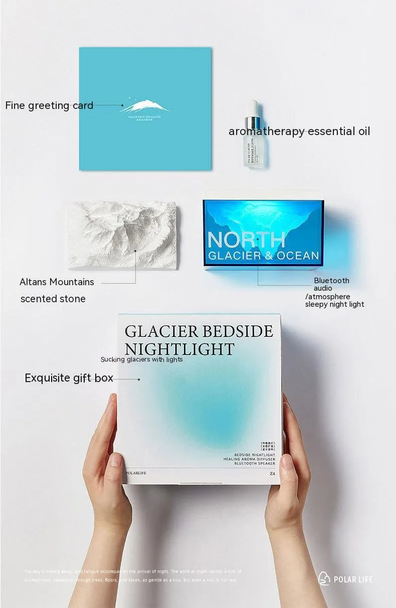 Glacier night light Bluetooth speaker on bedside table with soft ambient glow and compact size 13.8 x 8.5 cm