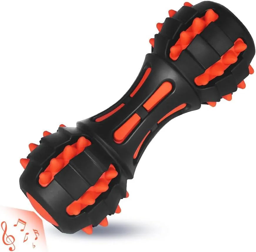 Red rubber dumbbell-shaped squeaky toy for dogs on a white background.
