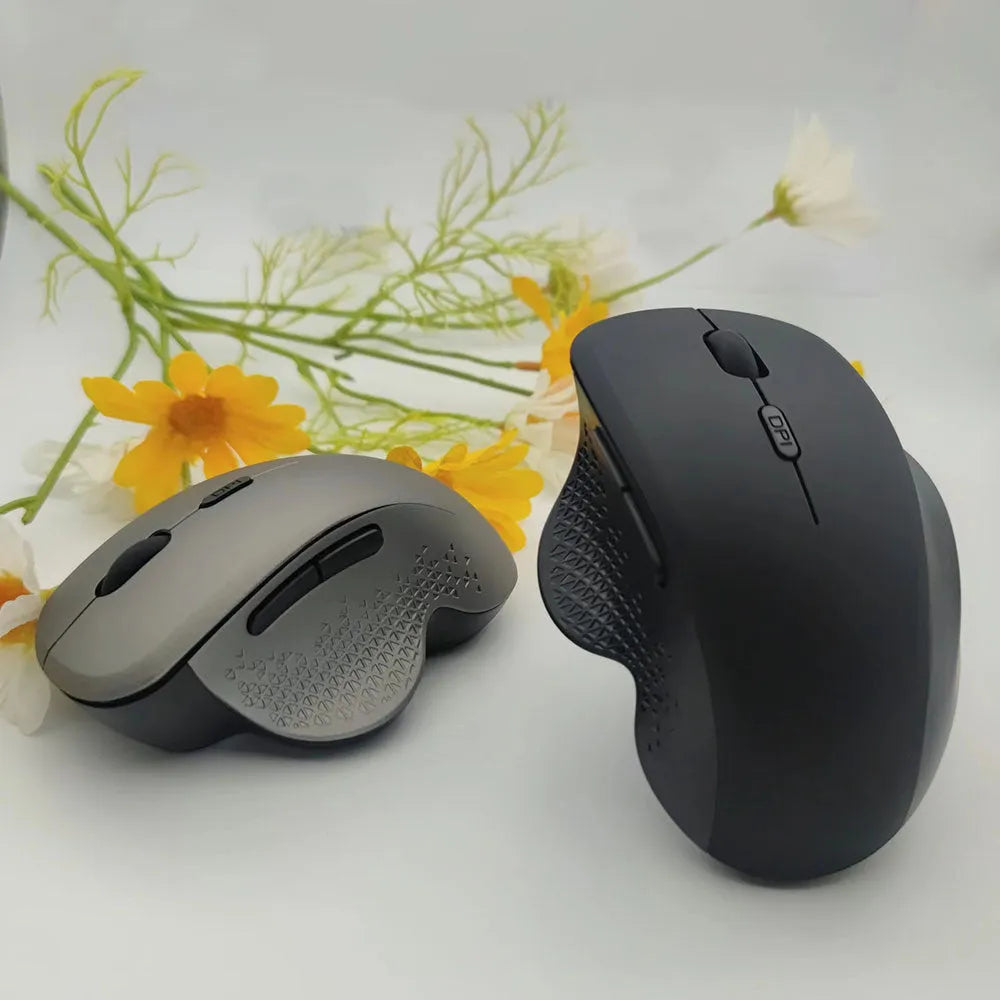 Grey and black wireless laptop mouse with USB charging cable
