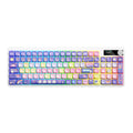 Black mechanical gaming keyboard with RGB backlighting next to a laptop