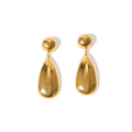 A pair of gold-coloured stainless steel pendant earrings with a geometric water drop hemisphere shape.
