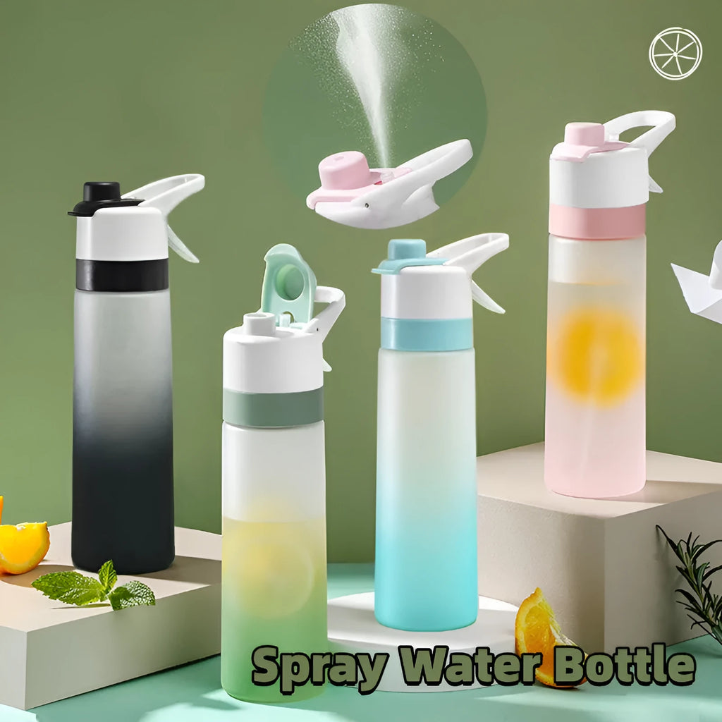 White plastic spray water bottle with handle strap and leakproof lid on a gym bag.