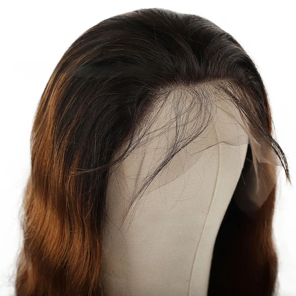 A woman wearing a long, gradient brown human hair lace front wig with a natural hairline.