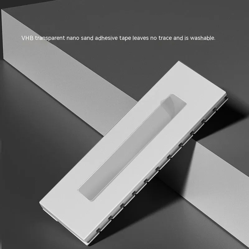 Black and white piano-shaped plastic parking sign measuring 148mm wide