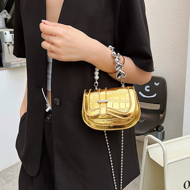 Women's PU leather mini tote crossbody bag in saddle silhouette with single shoulder strap