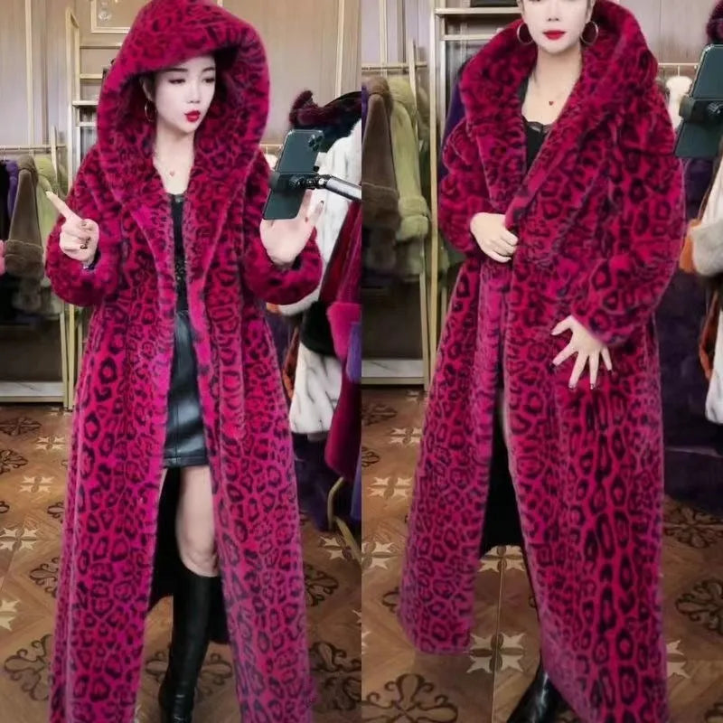 Long brown leopard print artificial fur coat for women on a hanger, showing its loose, lengthened fit.
