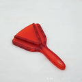 Red plastic can opener with integrated adjustable telescopic bottle opener and non-slip handle.