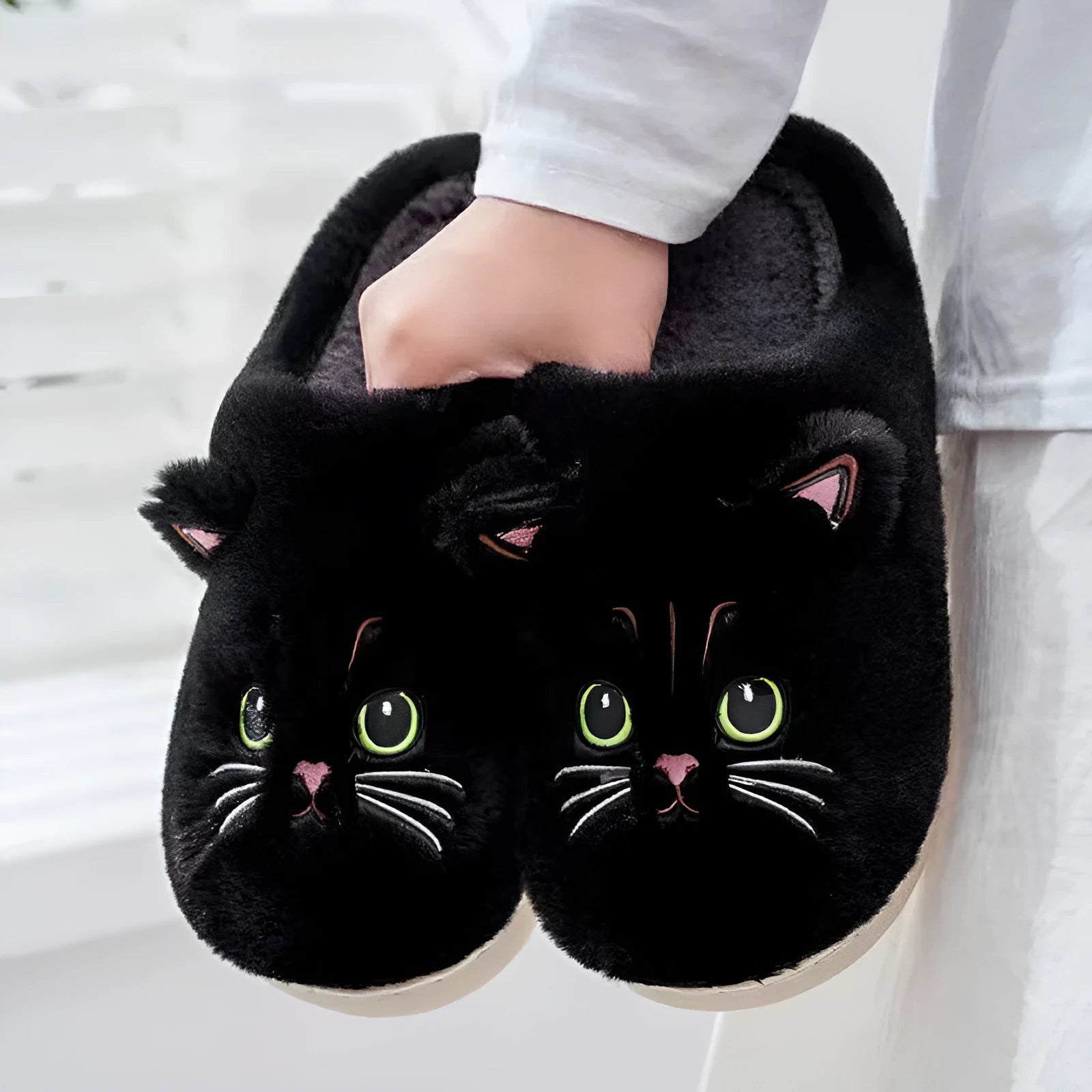 Cute cat plush slippers with non-slip EVA sole, thickened design, available in pink colour on a floor surface