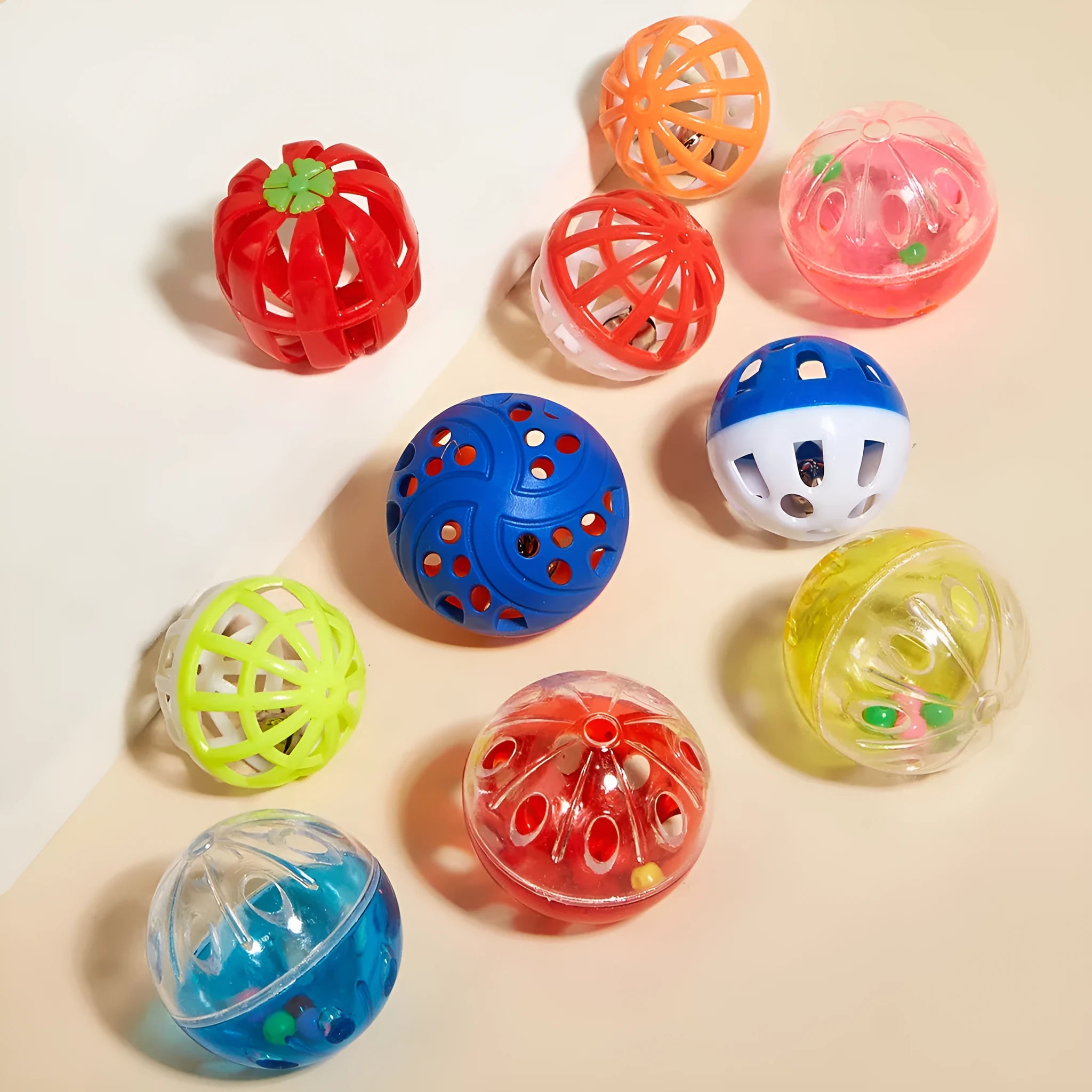 Colored plastic bell mesh hollow sound cat teasing ball in rainbow colour