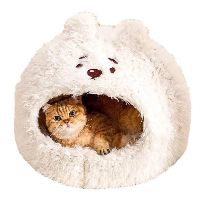Semi-enclosed yurt-style cat litter tent in an animal print, shown next to a litter tray.