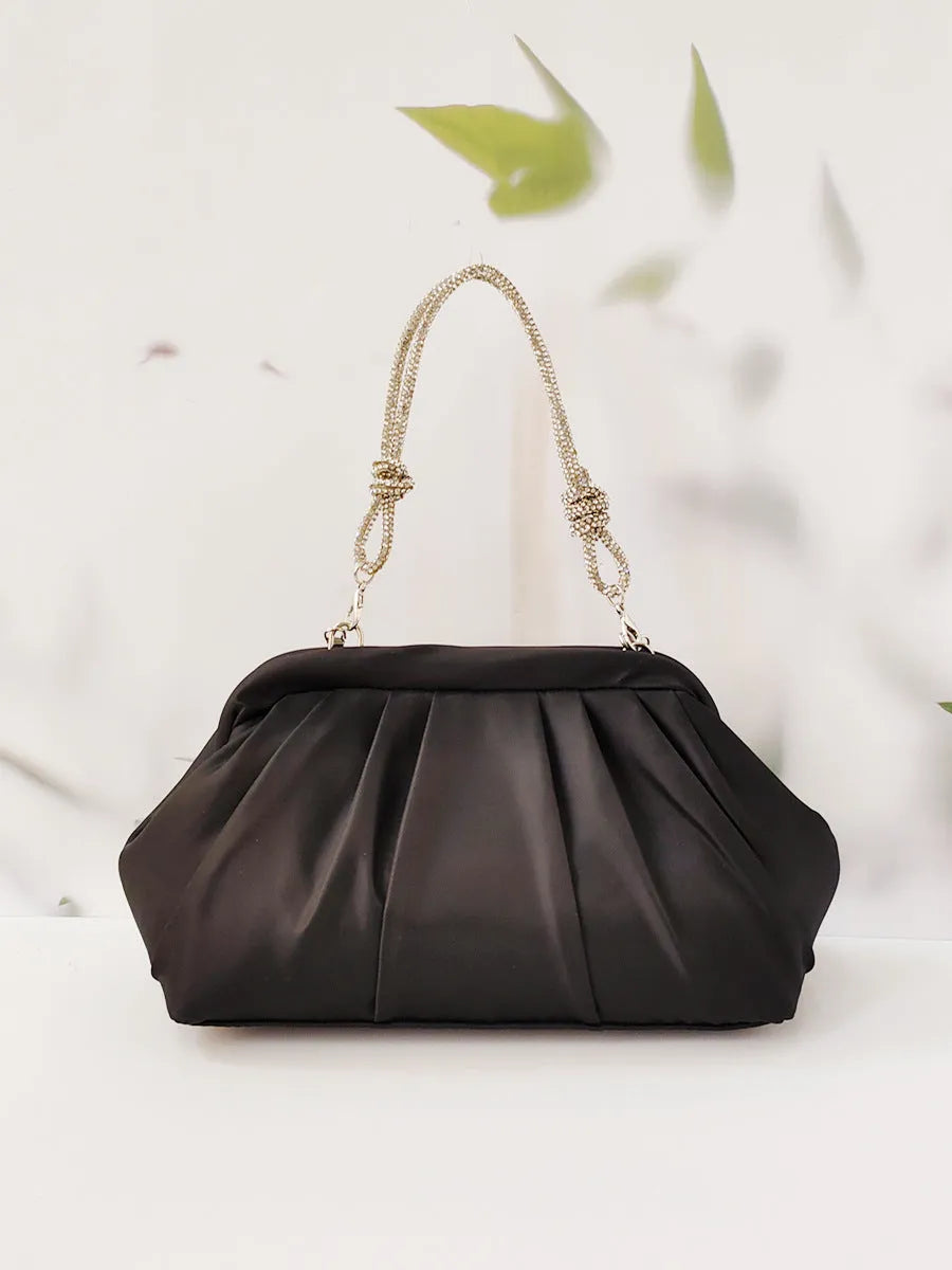 Soft black polyester women's crossbody messenger bag with chain strap and diamond pattern.