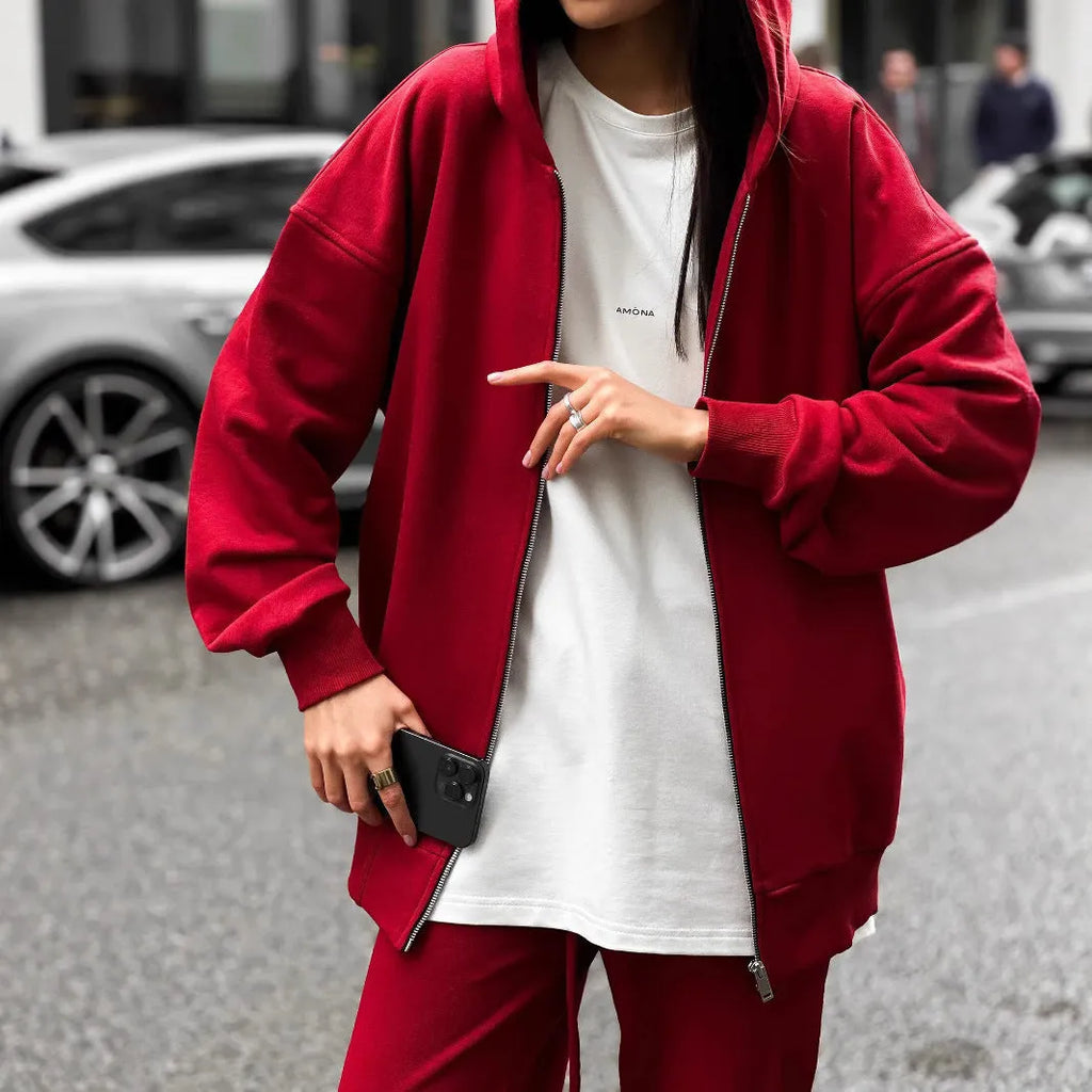 Red loose fit polyester two-piece set featuring a long-sleeved coat and matching trousers for a street style look.