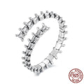 Women's silver tone adjustable backbone open ring with pumpkin skull motif on black background