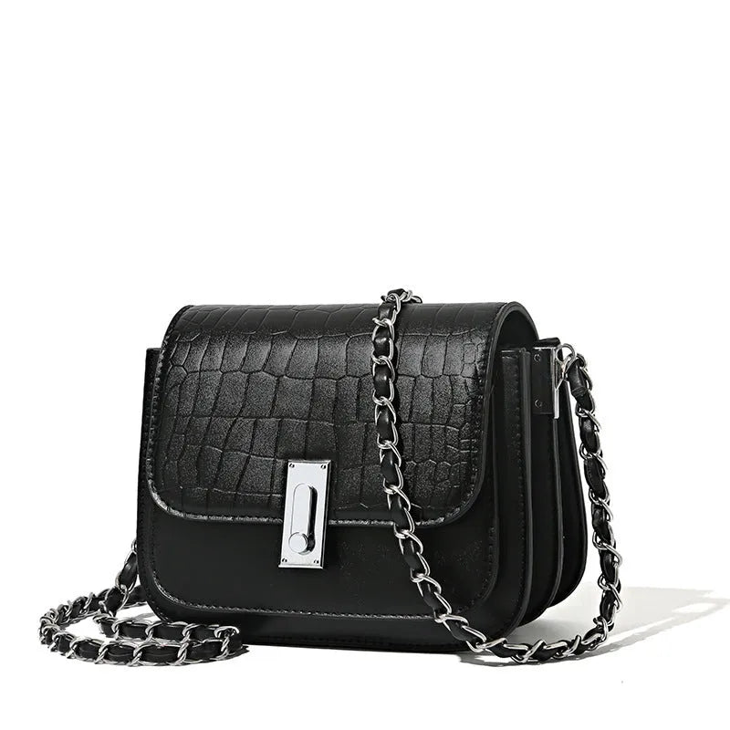 Soft PU women's fashion shoulder bag in horizontal square shape with phone compartment.