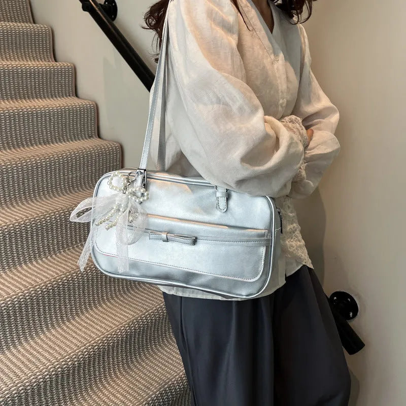 Women's black PU leather single-shoulder bag with flap closure and double straps showing internal mobile phone compartment