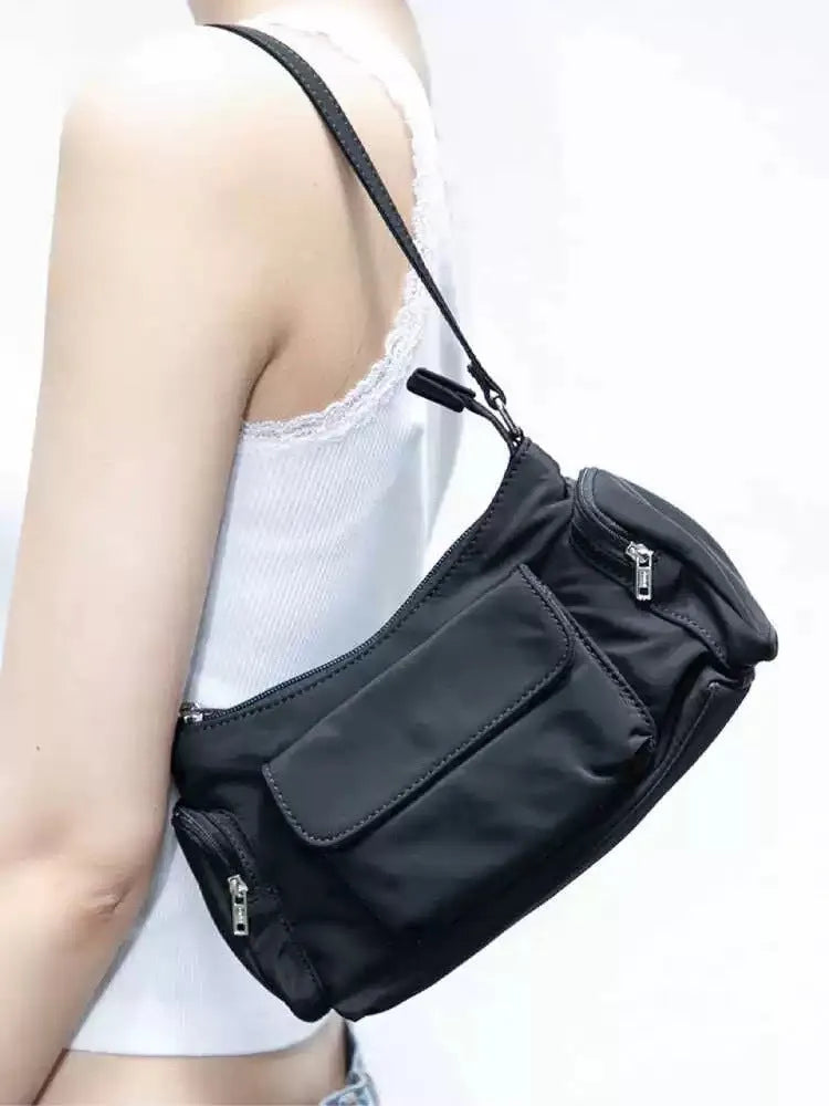 Black PU leather women's shoulder bag with double pockets showing side line design