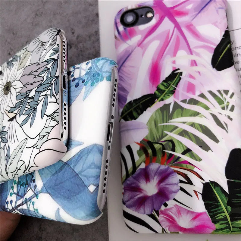 White leaf and morning glory flower oil painting design on an iPhone protective case.