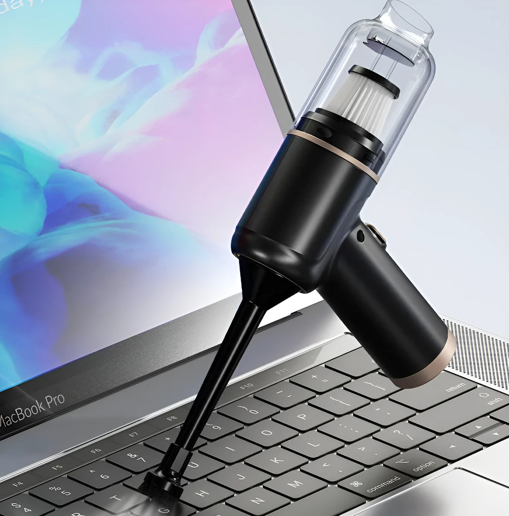 Black wireless handheld vacuum cleaner with attachments including nozzles and brushes on a white background.