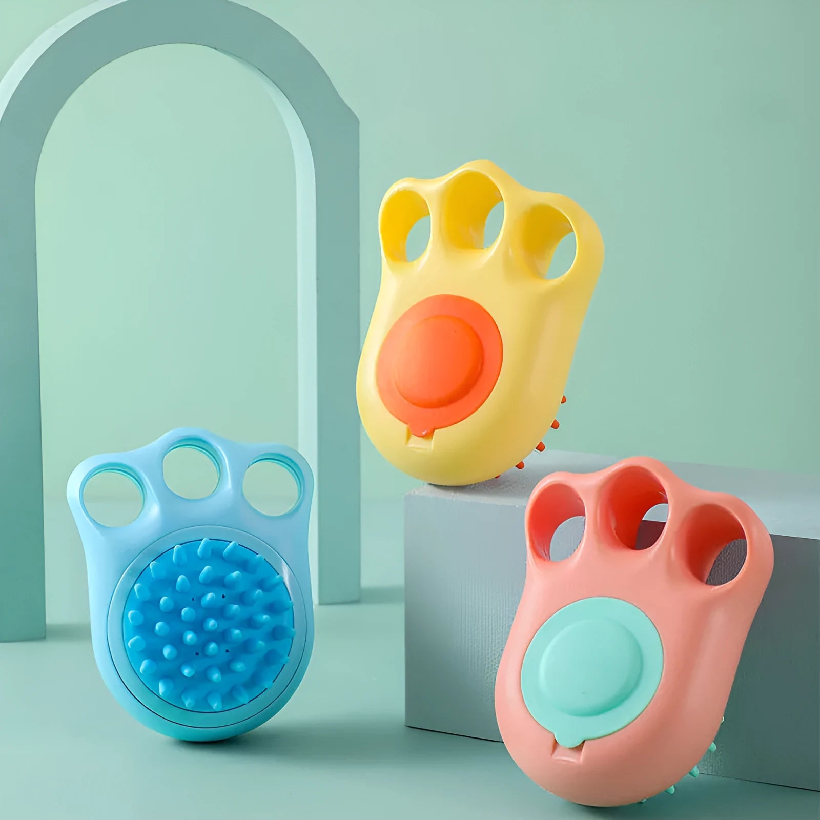 Pet bath brush with silicone cat claw design and massage nodules for dog and cat grooming during bath time