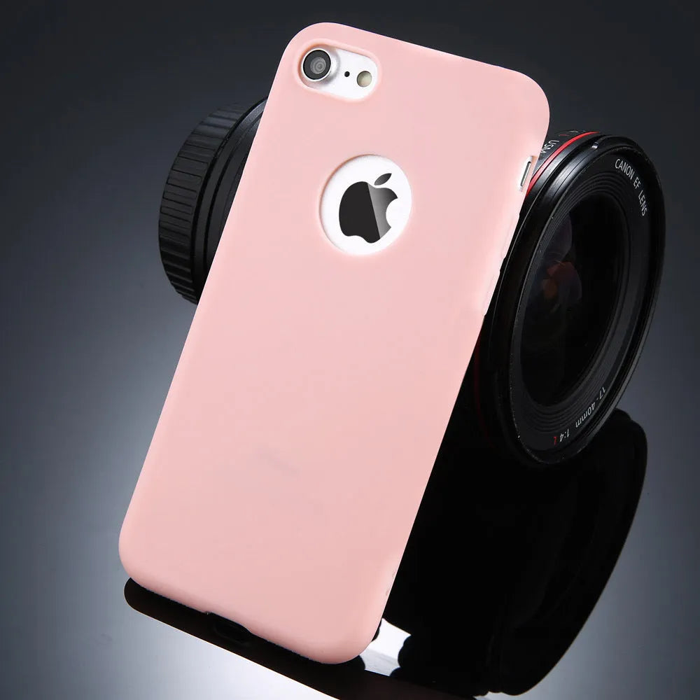 USLION soft silicon candy colour phone case for iPhone X XR 7 6 5 models on a table.