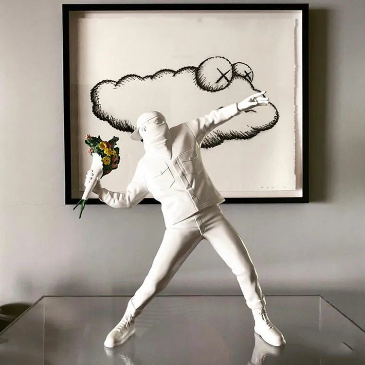 Banksy Throw Flower Boy sculpture decoration, 44cm polystone statue in black or white