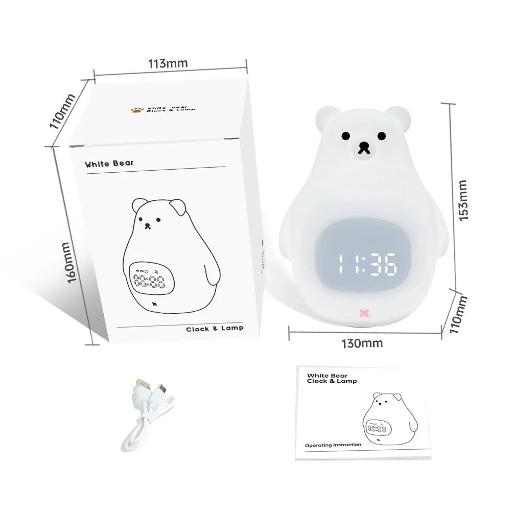 White silicone bear-shaped night light with soft glow, remote control, and button switch on a bedside table.