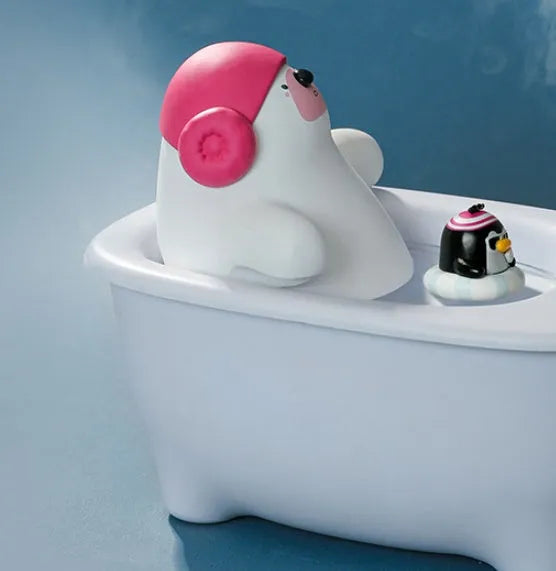 White USB-powered air humidifier and aromatherapy diffuser unit on a desk.