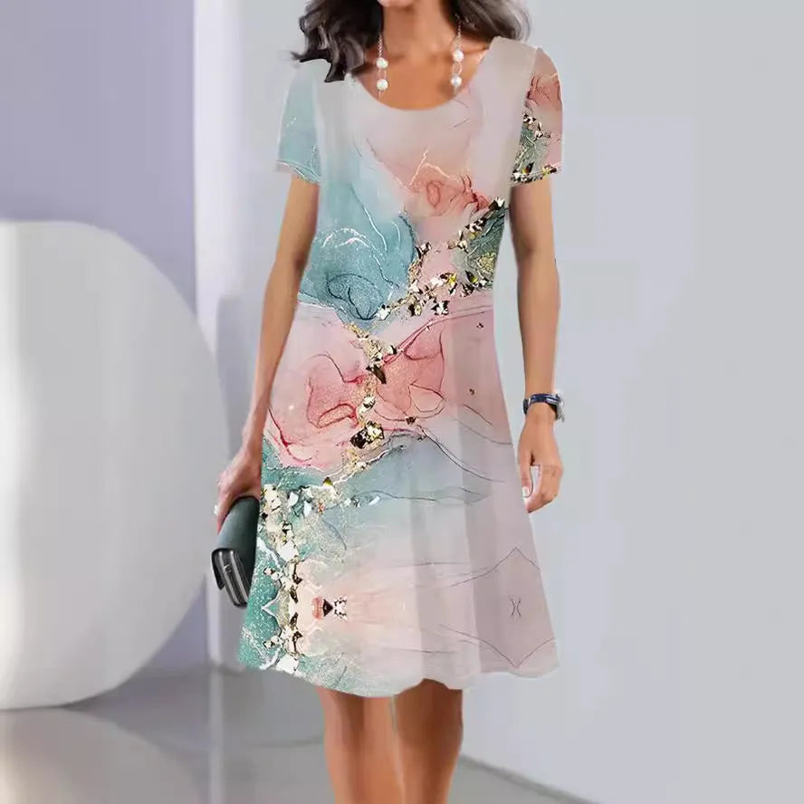 Women's floral print summer dress with short sleeves and an A-line midi skirt on a hanger.