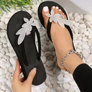 Women's cloth upper slippers in black with rubber sole for indoor casual wear