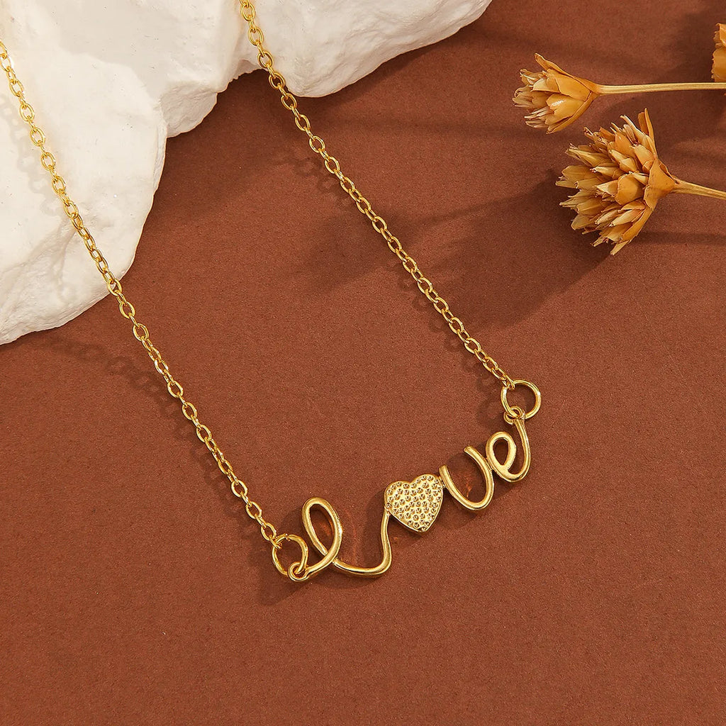 Gold plated copper infinity love pendant necklace with diamond accents and fine chain.