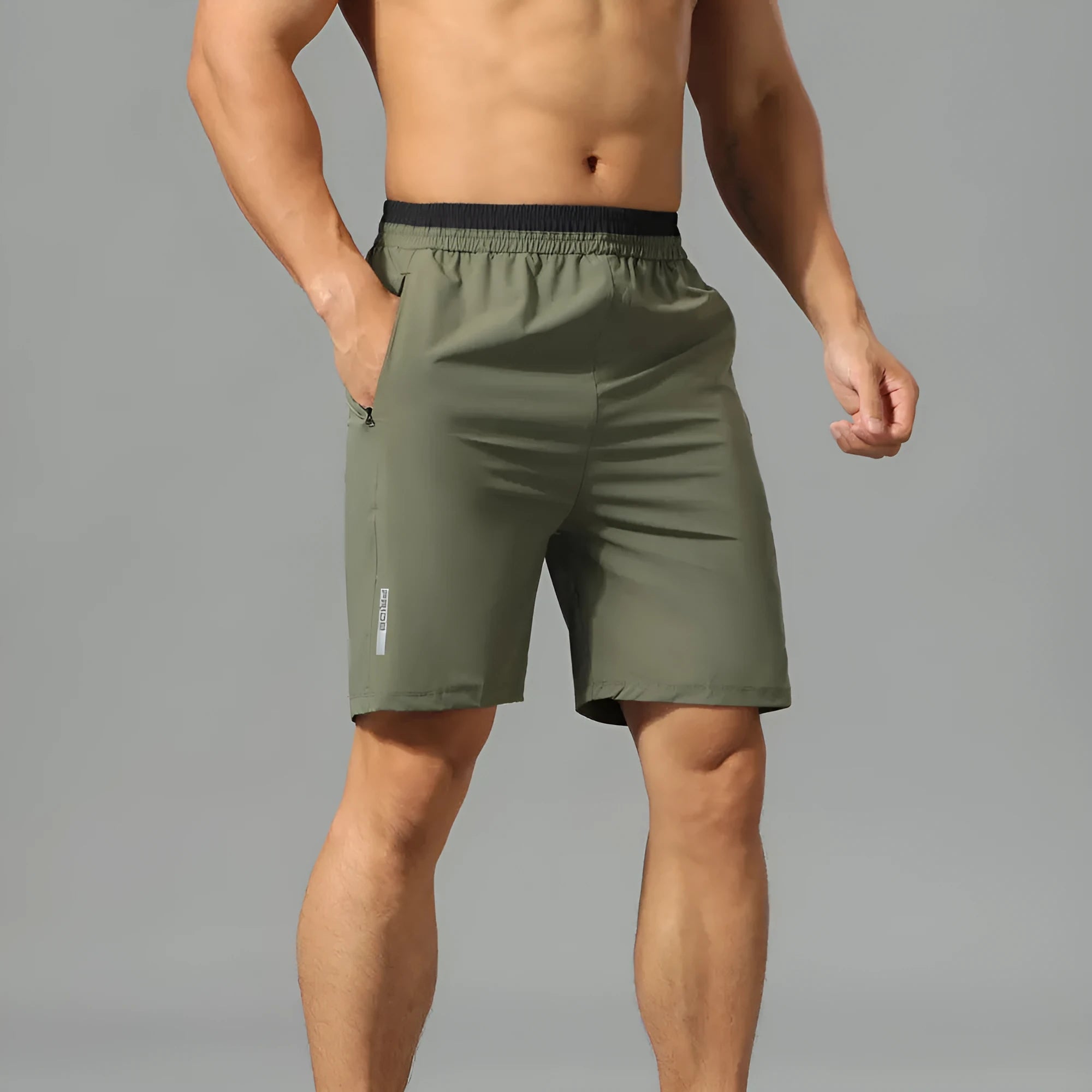 Men's loose grey ice silk quick-dry cropped running shorts on a white background.