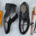 Men's black PU leather lace-up boot with stitching detail and a rubber sole on a neutral background