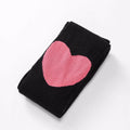 Girl's cotton leggings with five-pointed star and heart patterns in solid colour design