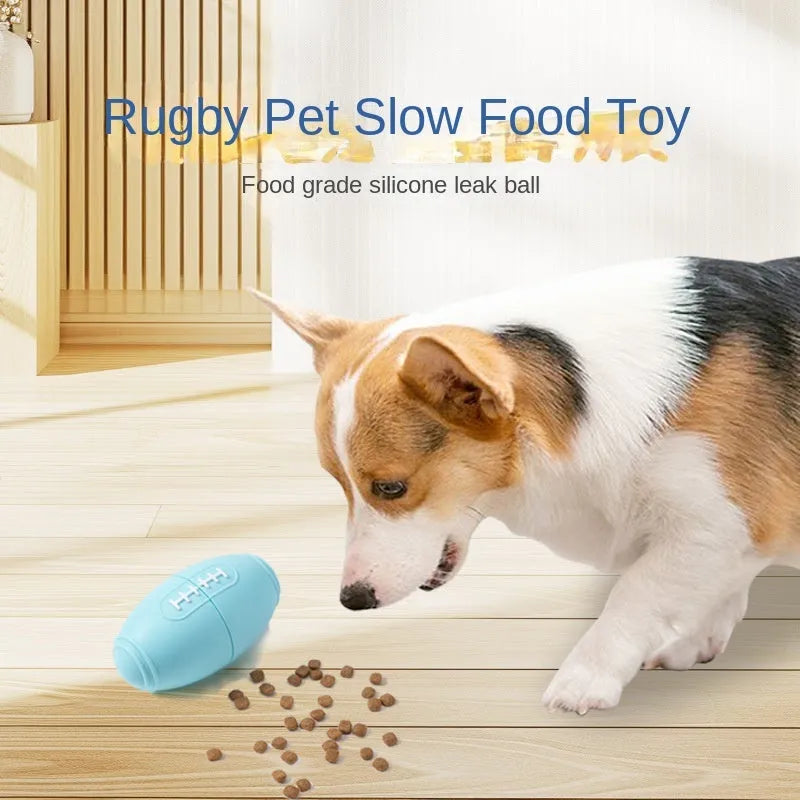 Blue silicone rugby ball dog toy with treat-dispensing centre for chewing and fetching
