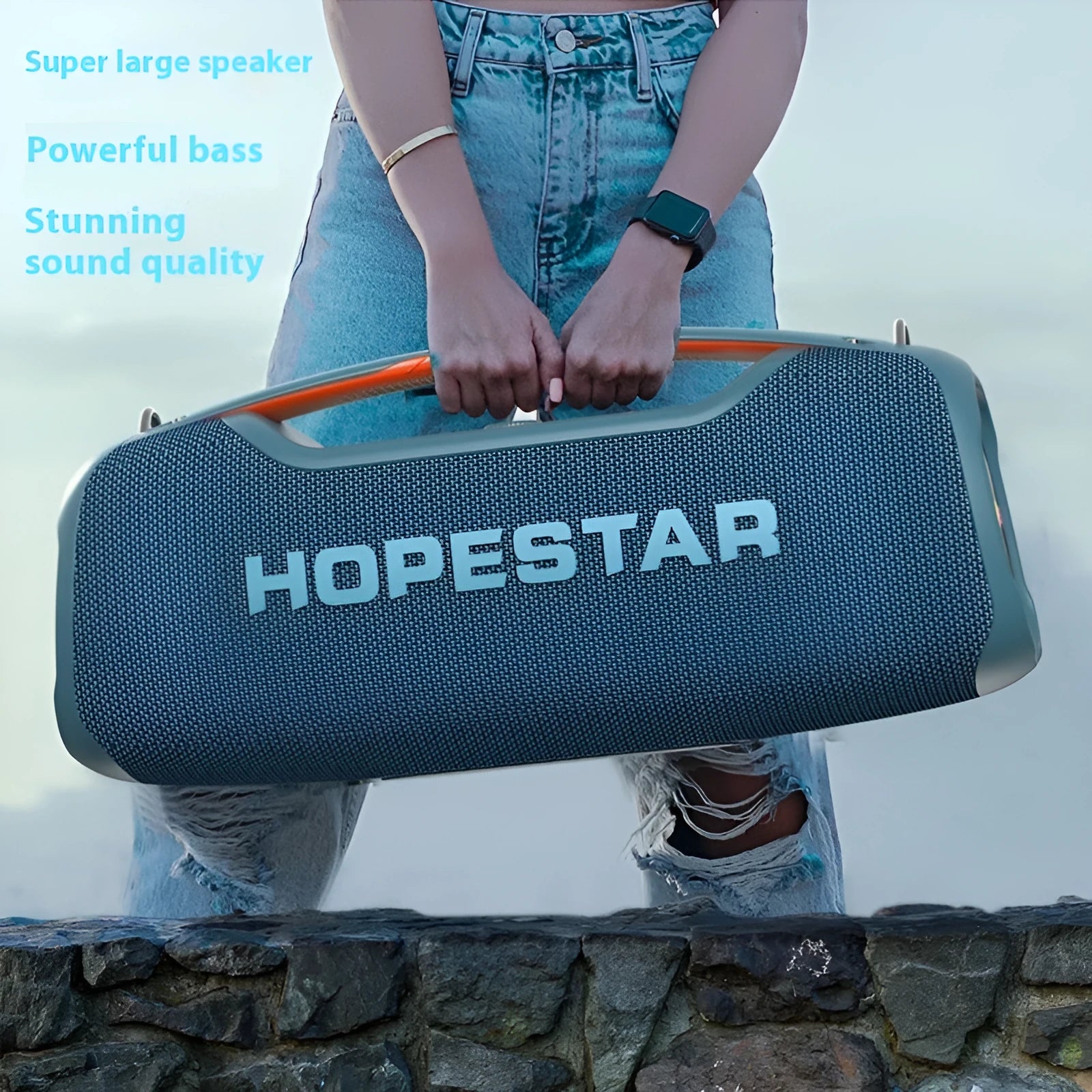 Super Bass Bluetooth speaker in black colour with microphone, showing waterproof outdoor portable design.
