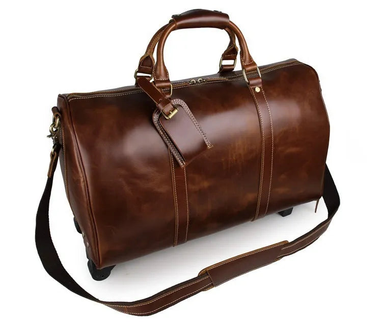 21 inch head layer cowhide trolley bag in brown glossy leather with telescopic handle and wheels