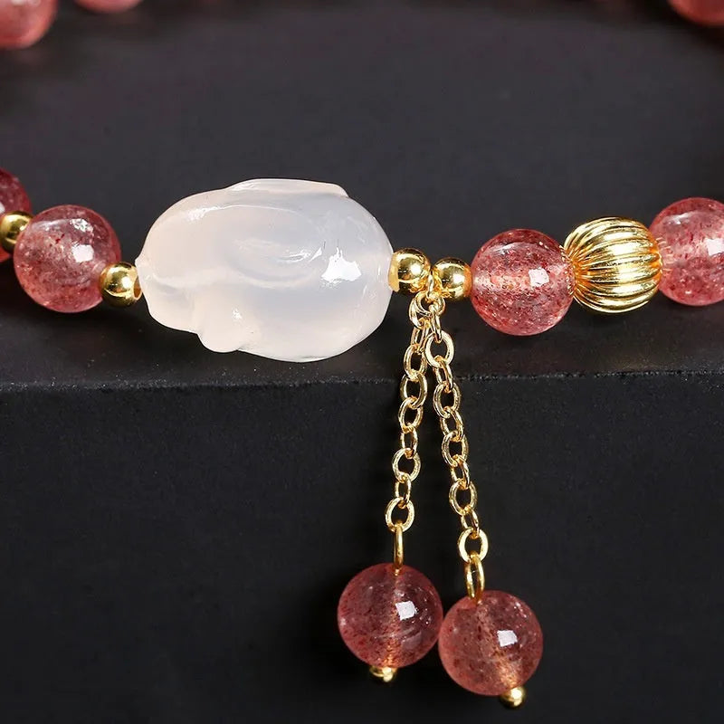 Strawberry quartz agate white rabbit bracelet with 6mm beads, geometric round design.