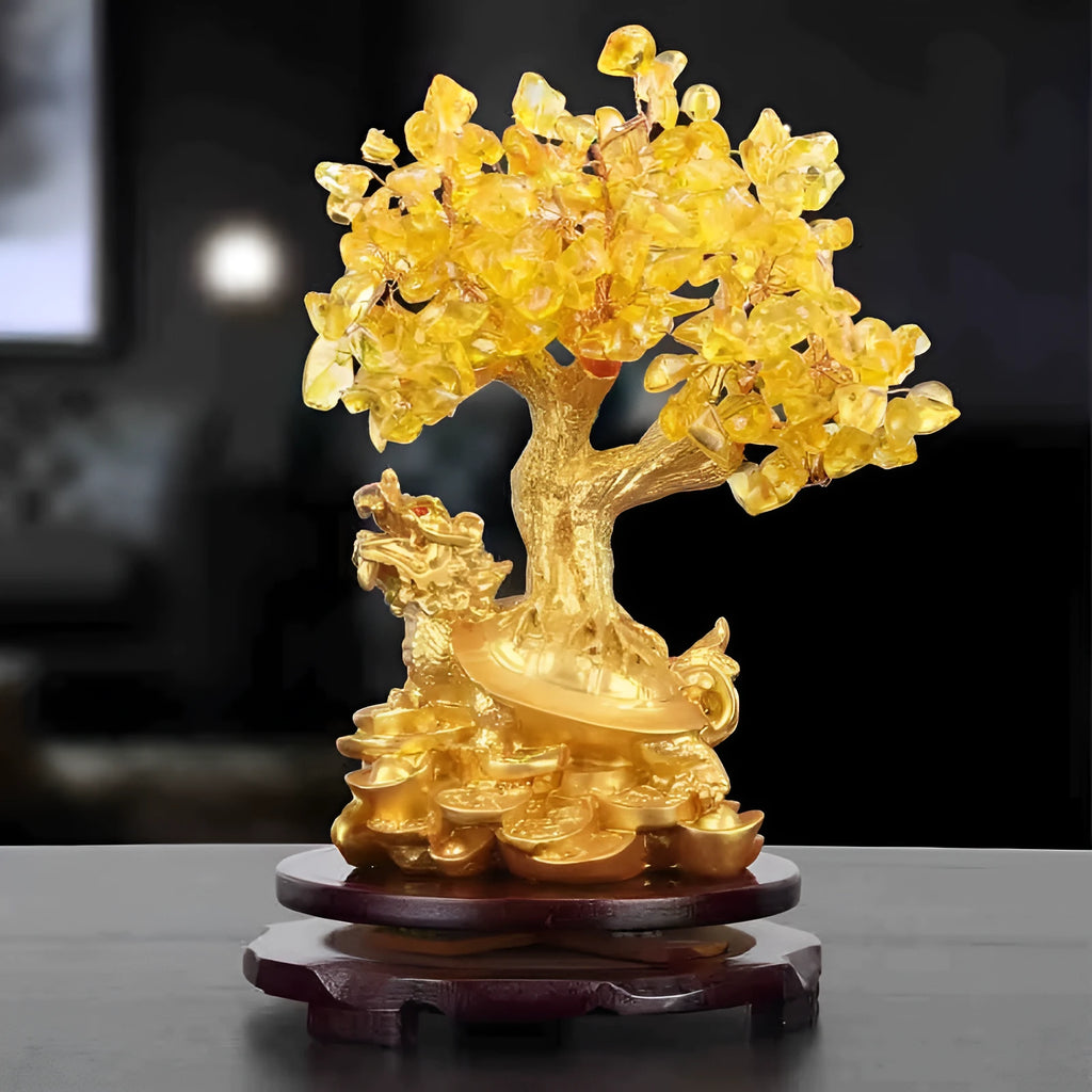 Citrine-coloured resin ornament of a turtle money tree in Chinese Feng Shui style.