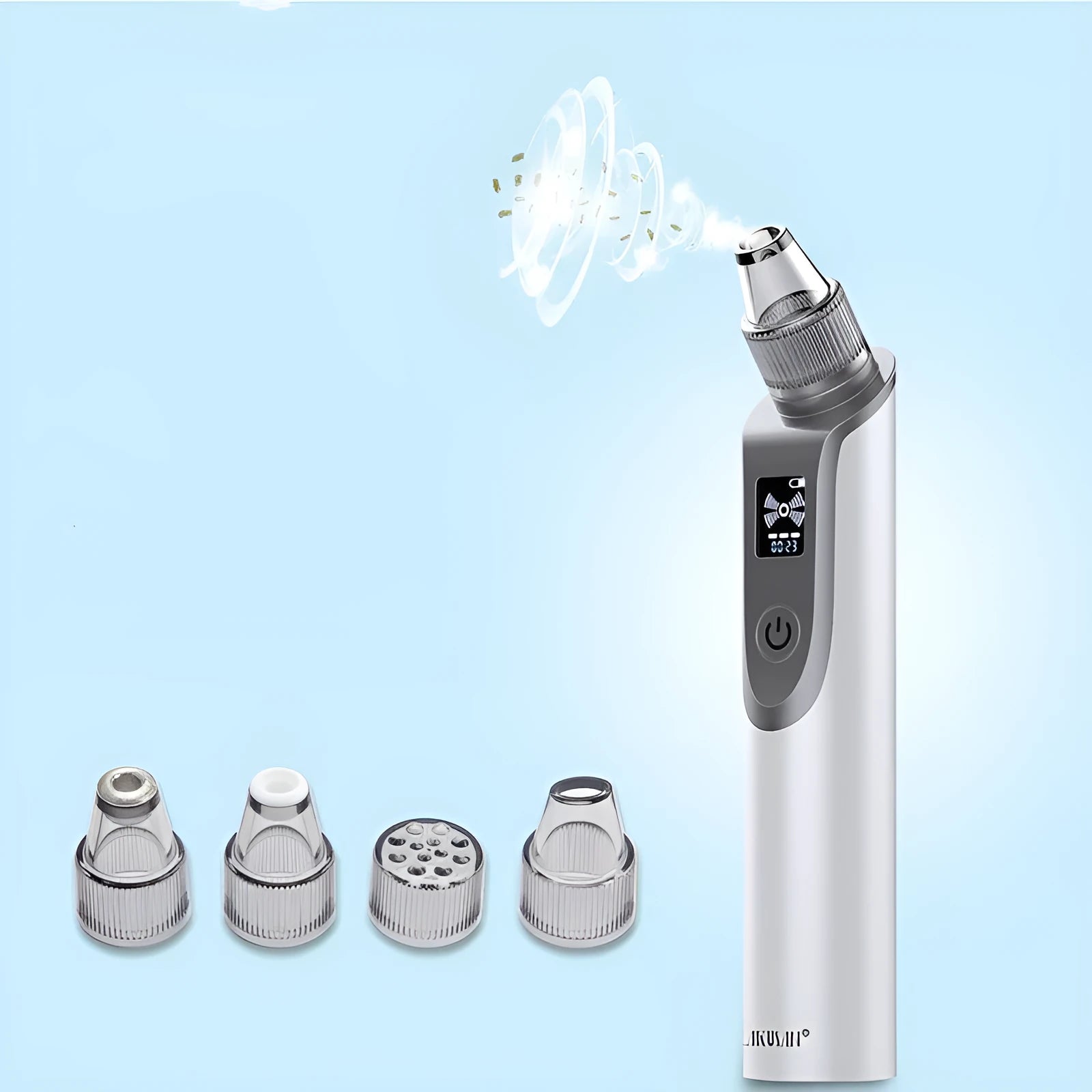 White handheld ultrasonic facial cleansing instrument with interchangeable suction heads on a clean surface.